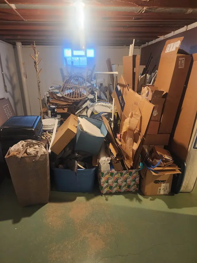 Roll-off dumpster container at job site for 2 Yard Dumpster Rental in Lincoln